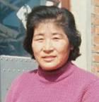 张玉兰，女，55岁，于2001年6月20日被迫害致死，脖子上有淡淡的勒痕，后背有青紫伤。